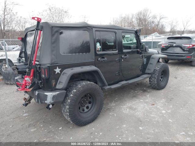 Photo 3 VIN: 1J4BA6H12BL565464 - JEEP WRANGLER UNLIMITED 