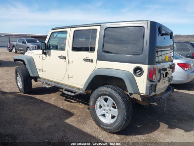 Photo 2 VIN: 1J4BA6H12BL580207 - JEEP WRANGLER UNLIMITED 