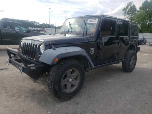 Photo 1 VIN: 1J4BA6H18BL570006 - JEEP WRANGLER U 