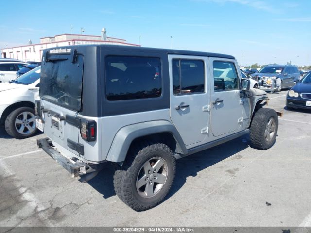 Photo 3 VIN: 1J4BA6H19AL148874 - JEEP WRANGLER UNLIMITED 