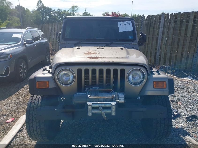 Photo 11 VIN: 1J4F449S44P744119 - JEEP WRANGLER 