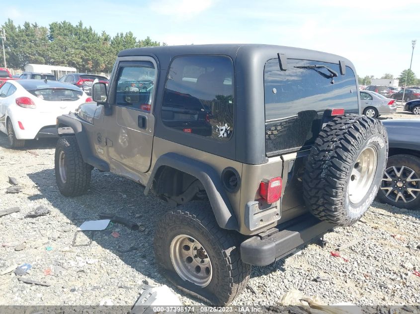 Photo 2 VIN: 1J4F449S44P744119 - JEEP WRANGLER 