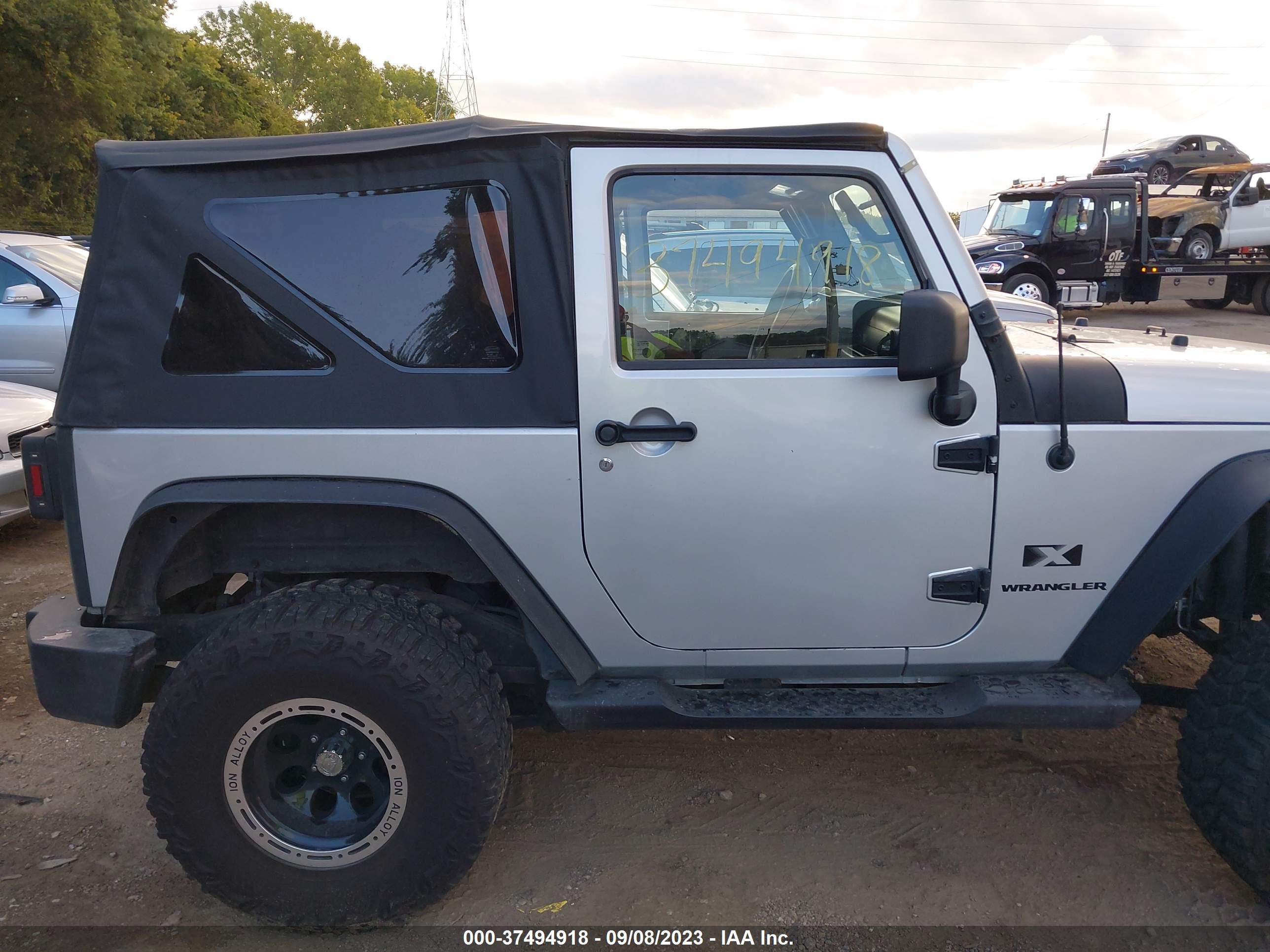 Photo 12 VIN: 1J4FA24138L540243 - JEEP WRANGLER 