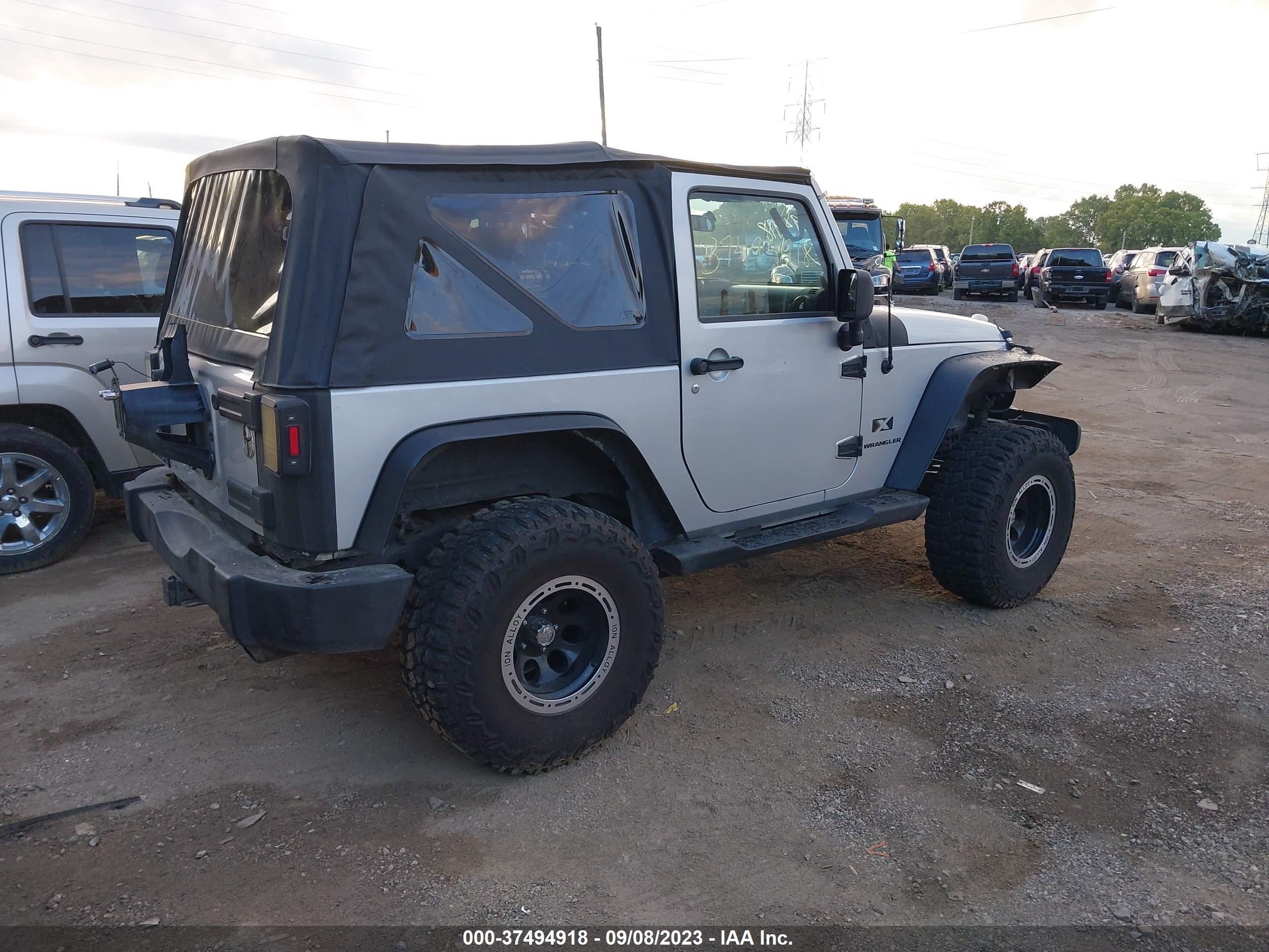 Photo 3 VIN: 1J4FA24138L540243 - JEEP WRANGLER 