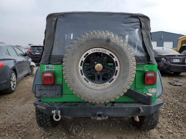 Photo 5 VIN: 1J4FA29124P746004 - JEEP WRANGLER 