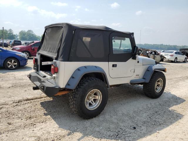 Photo 2 VIN: 1J4FA291X4P746509 - JEEP WRANGLER 