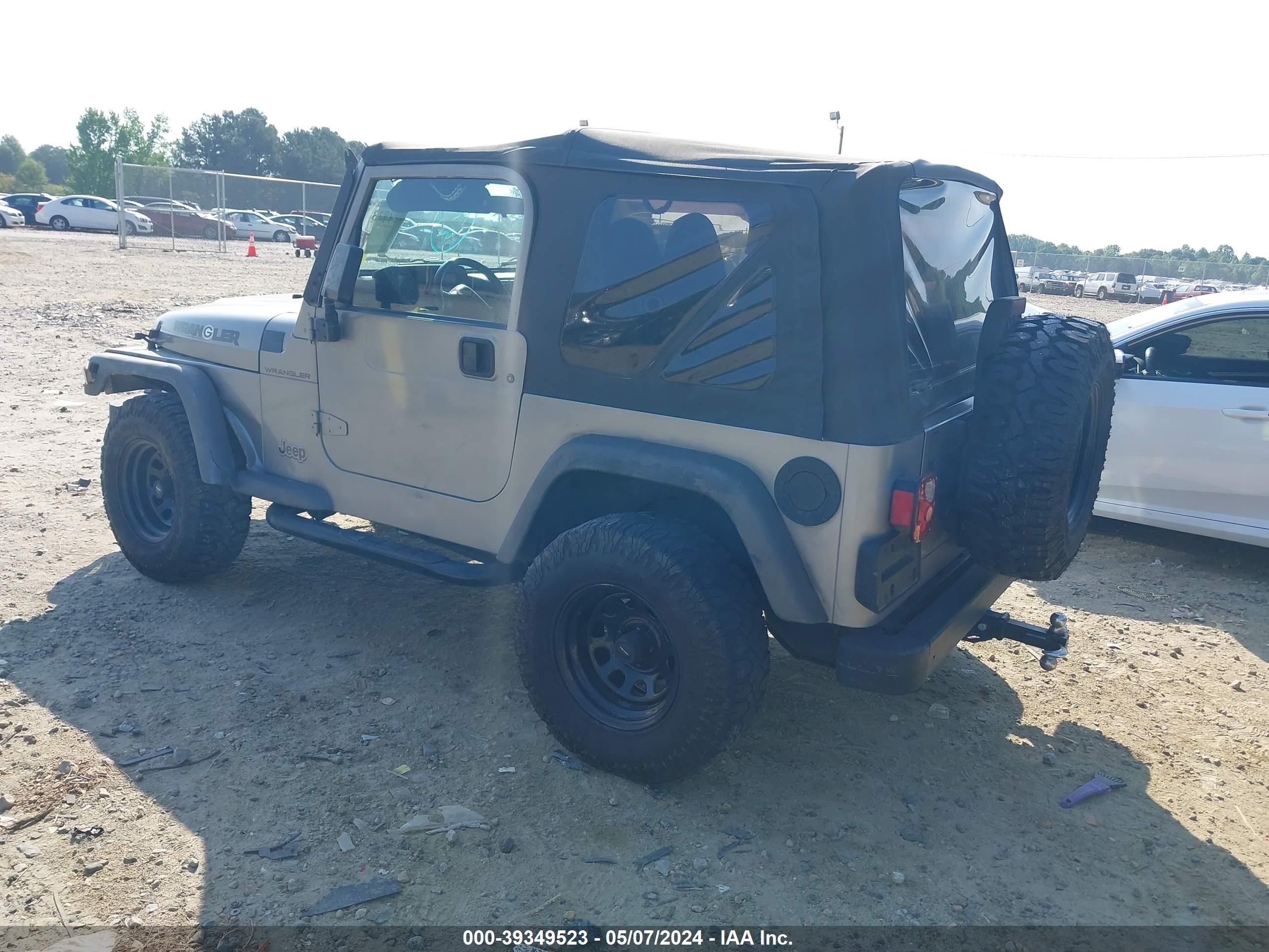 Photo 3 VIN: 1J4FA29P2YP753271 - JEEP WRANGLER 