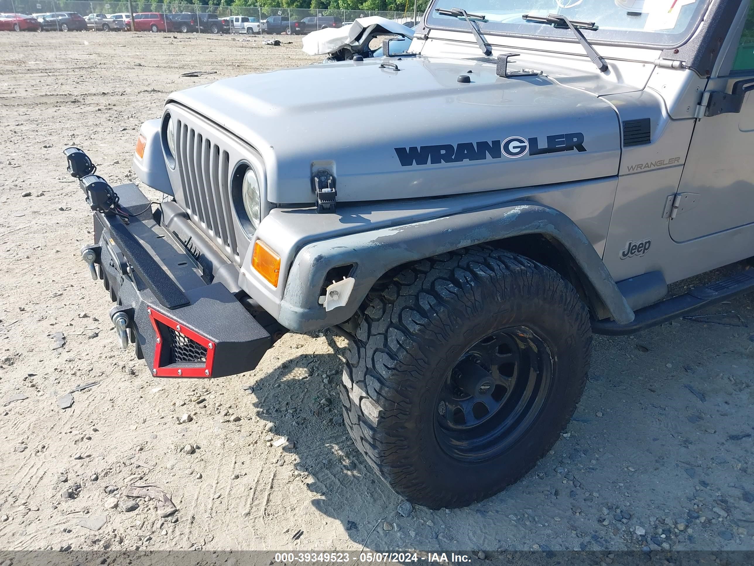 Photo 6 VIN: 1J4FA29P2YP753271 - JEEP WRANGLER 