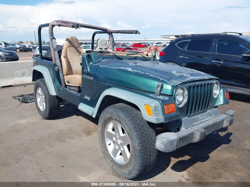 Photo 0 VIN: 1J4FA29P3YP700286 - JEEP WRANGLER 