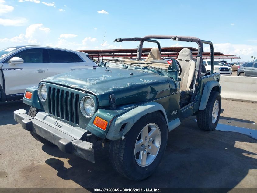 Photo 1 VIN: 1J4FA29P3YP700286 - JEEP WRANGLER 