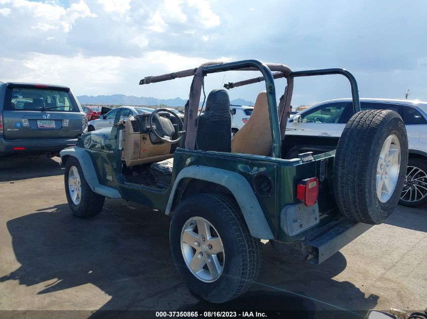 Photo 2 VIN: 1J4FA29P3YP700286 - JEEP WRANGLER 