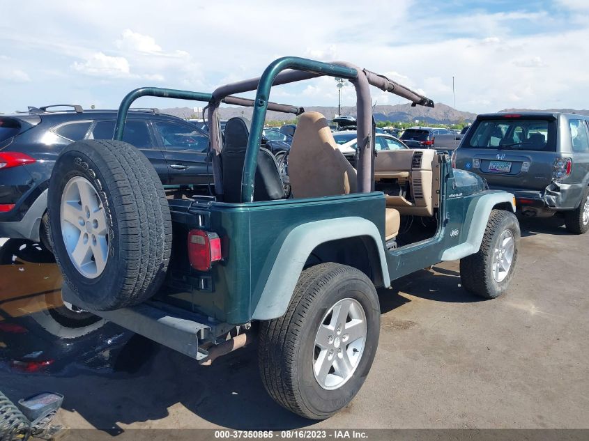 Photo 3 VIN: 1J4FA29P3YP700286 - JEEP WRANGLER 