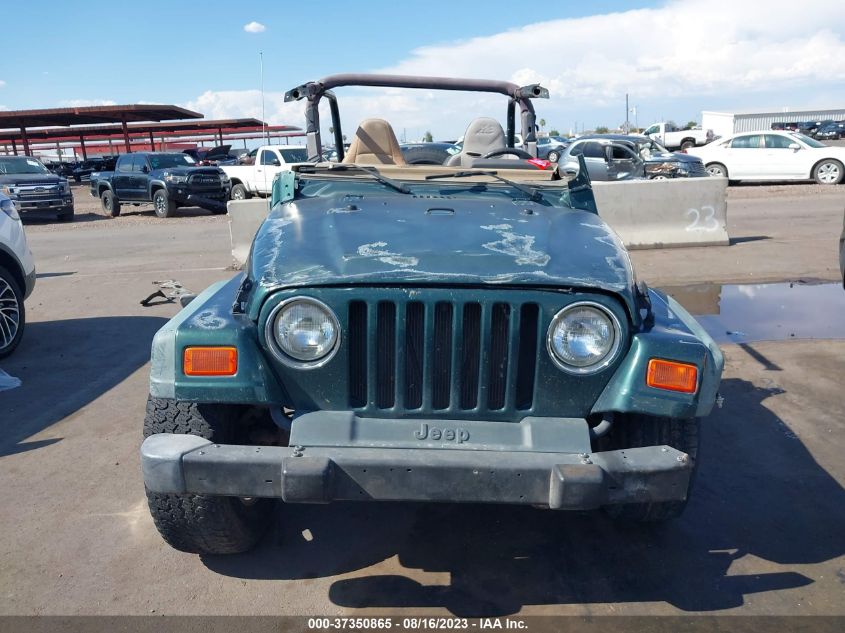 Photo 5 VIN: 1J4FA29P3YP700286 - JEEP WRANGLER 