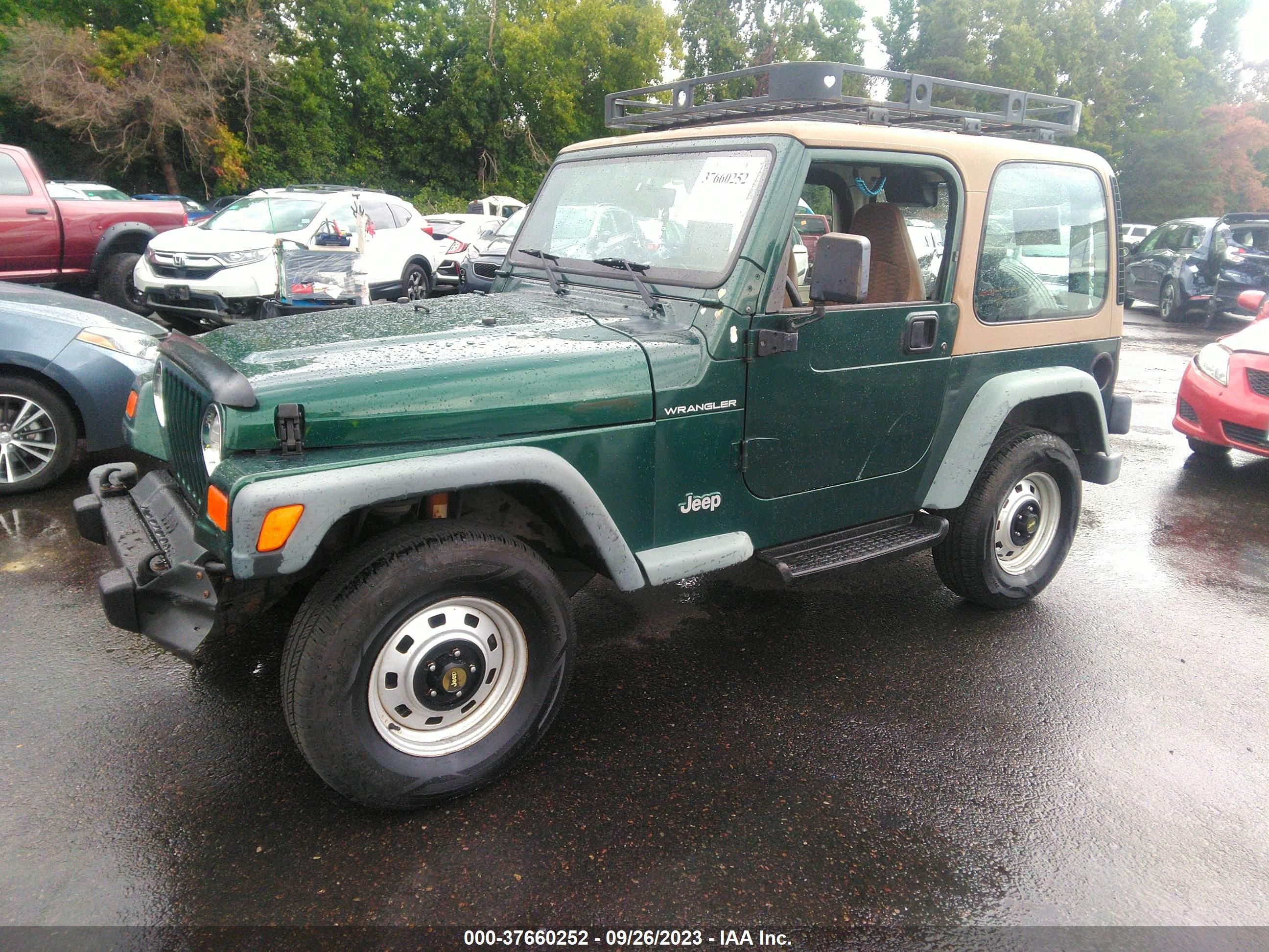 Photo 1 VIN: 1J4FA29P3YP714432 - JEEP WRANGLER 