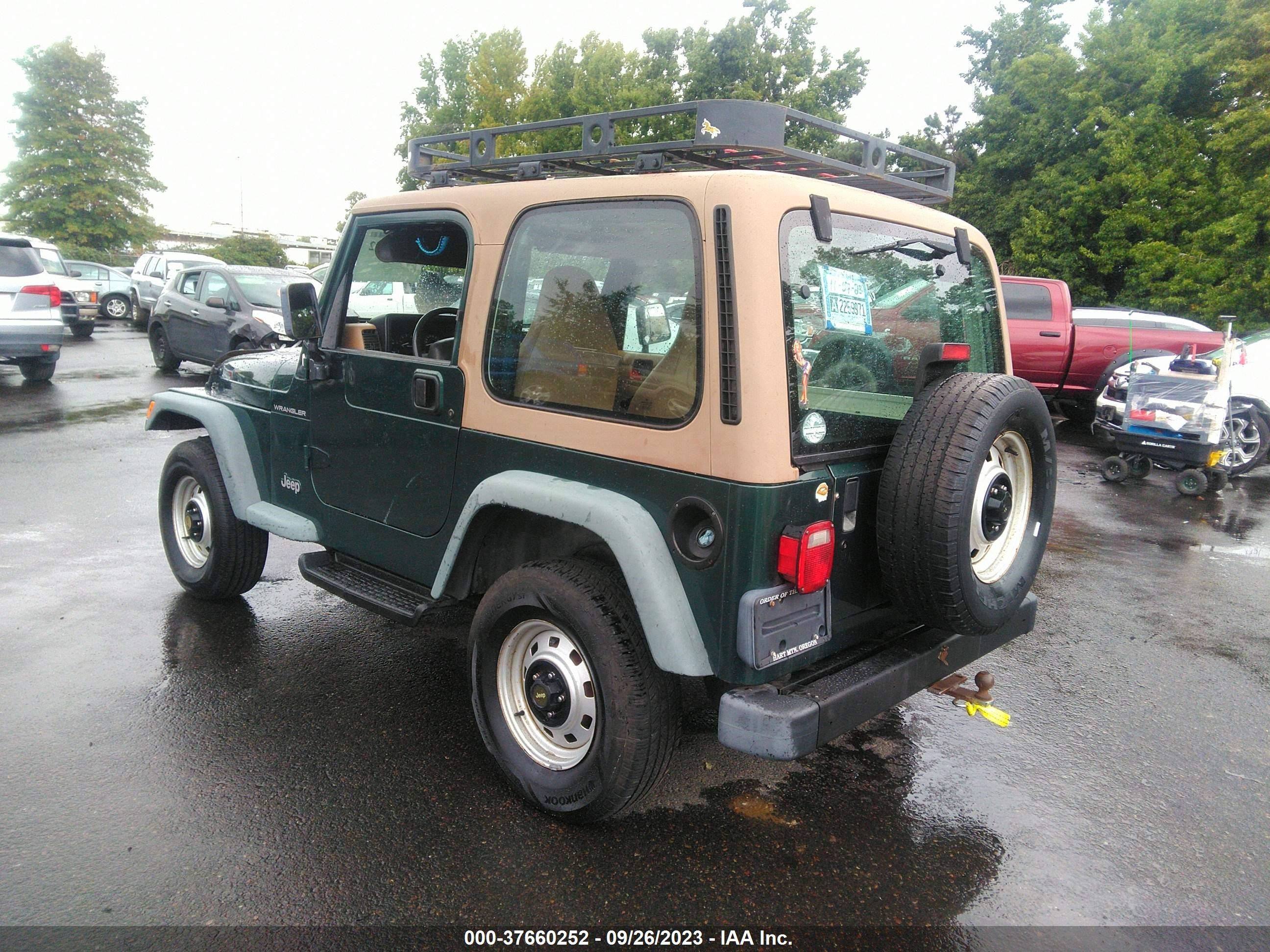 Photo 2 VIN: 1J4FA29P3YP714432 - JEEP WRANGLER 