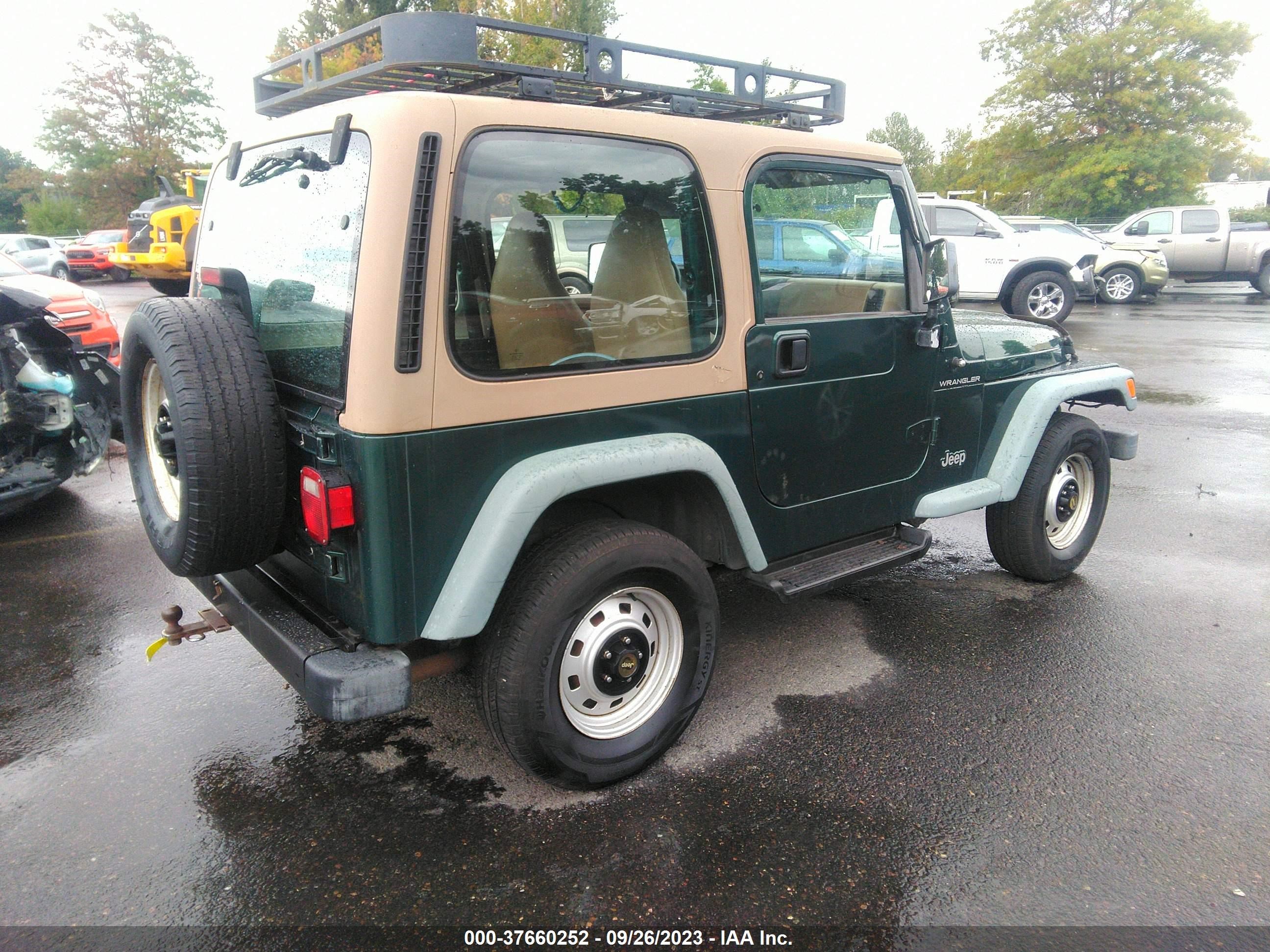 Photo 3 VIN: 1J4FA29P3YP714432 - JEEP WRANGLER 