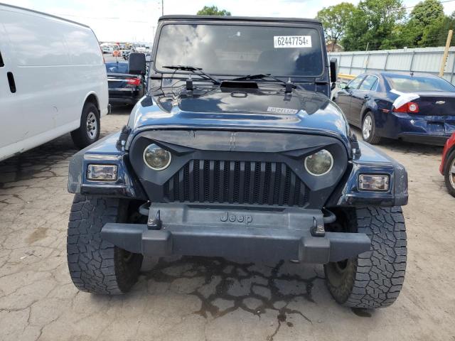 Photo 4 VIN: 1J4FA29P7YP731251 - JEEP WRANGLER 