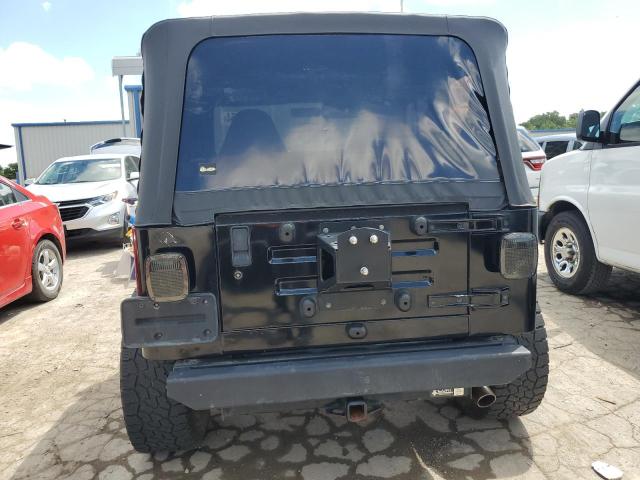 Photo 5 VIN: 1J4FA29P7YP731251 - JEEP WRANGLER 