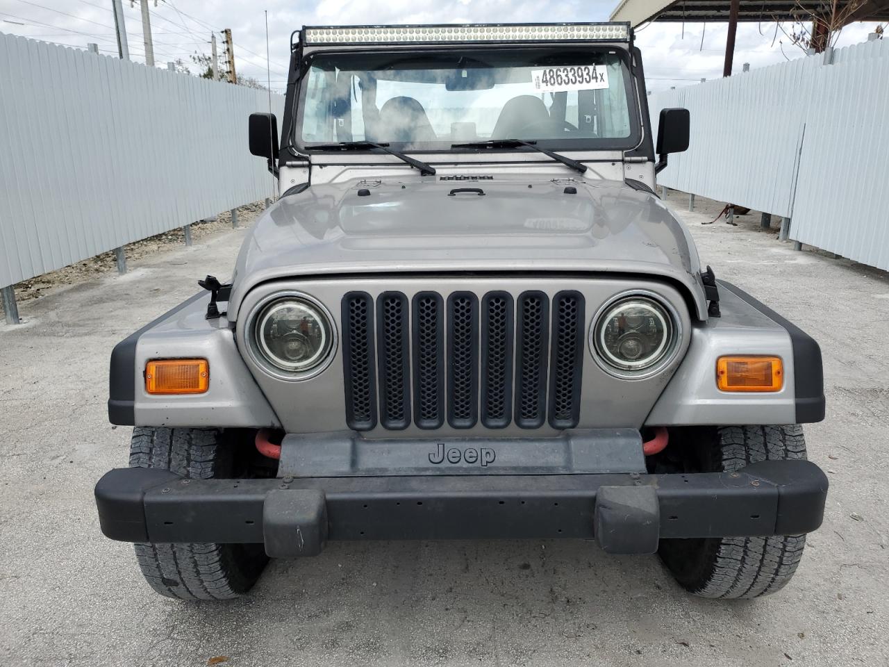 Photo 4 VIN: 1J4FA29P7YP787092 - JEEP WRANGLER 