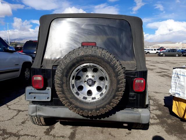 Photo 5 VIN: 1J4FA29P8YP724227 - JEEP WRANGLER 