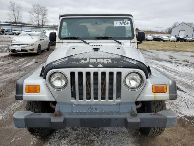 Photo 4 VIN: 1J4FA39S24P797811 - JEEP WRANGLER 