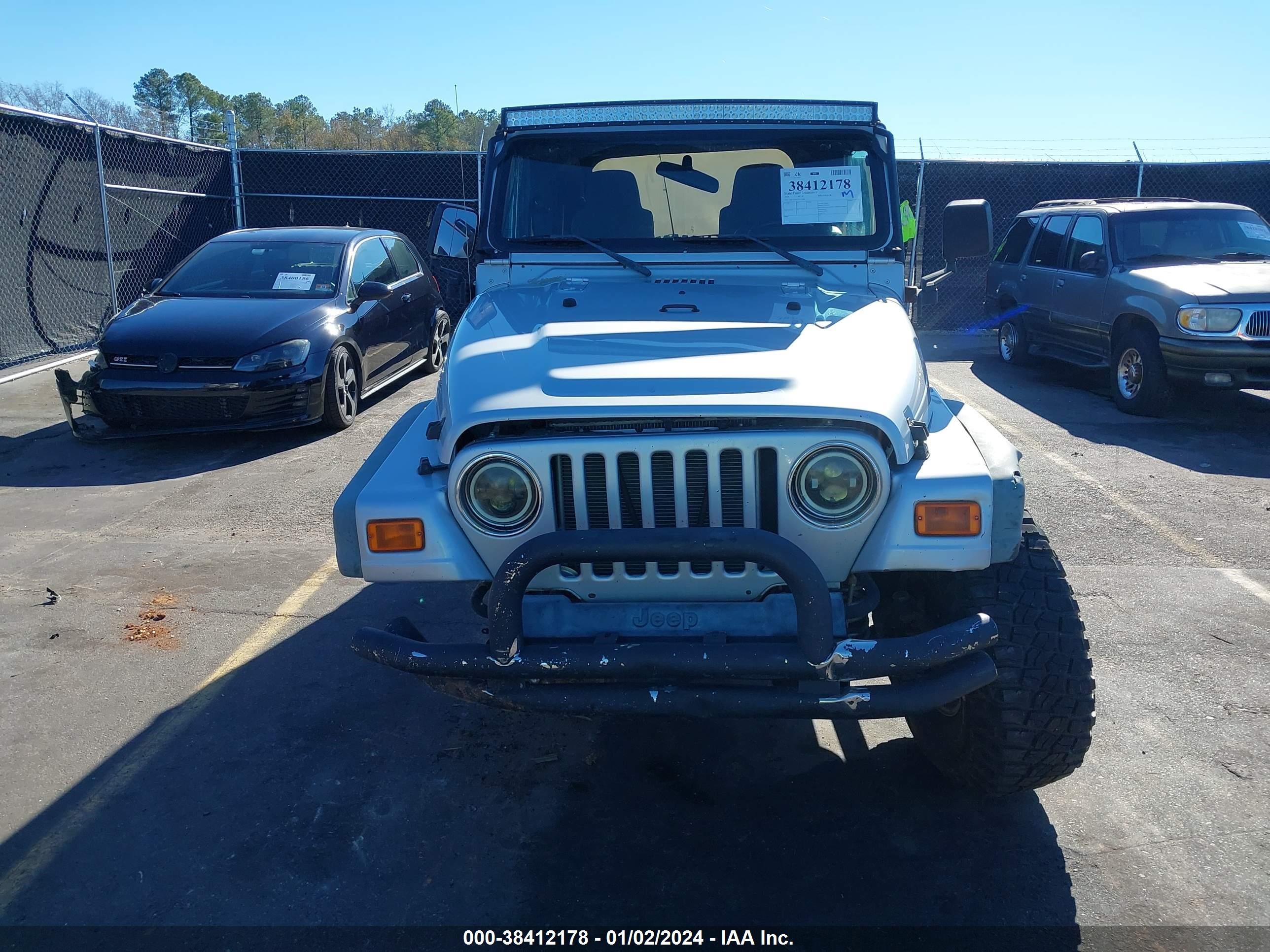 Photo 12 VIN: 1J4FA39S25P373109 - JEEP WRANGLER 