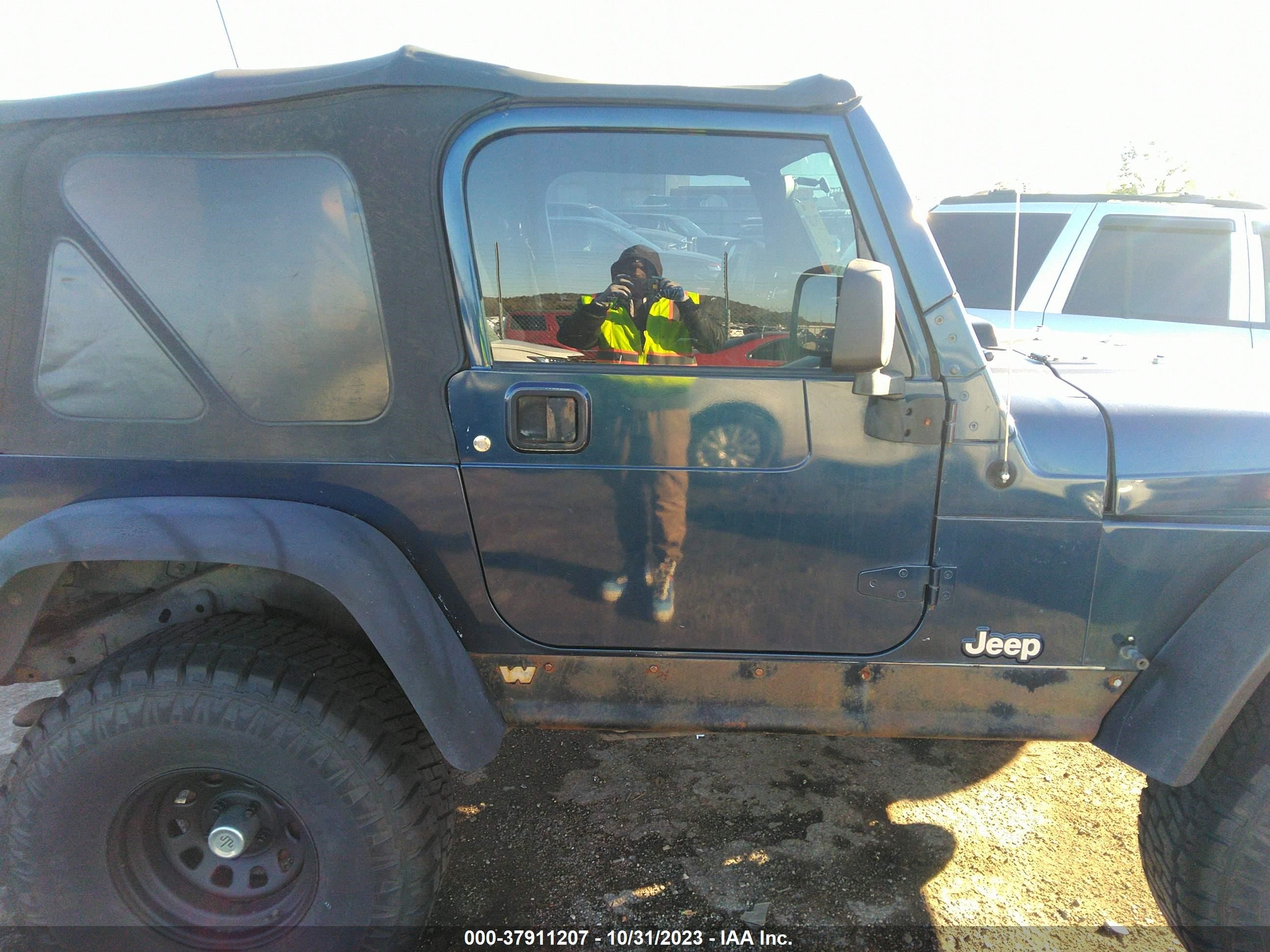 Photo 12 VIN: 1J4FA39S34P714967 - JEEP WRANGLER 