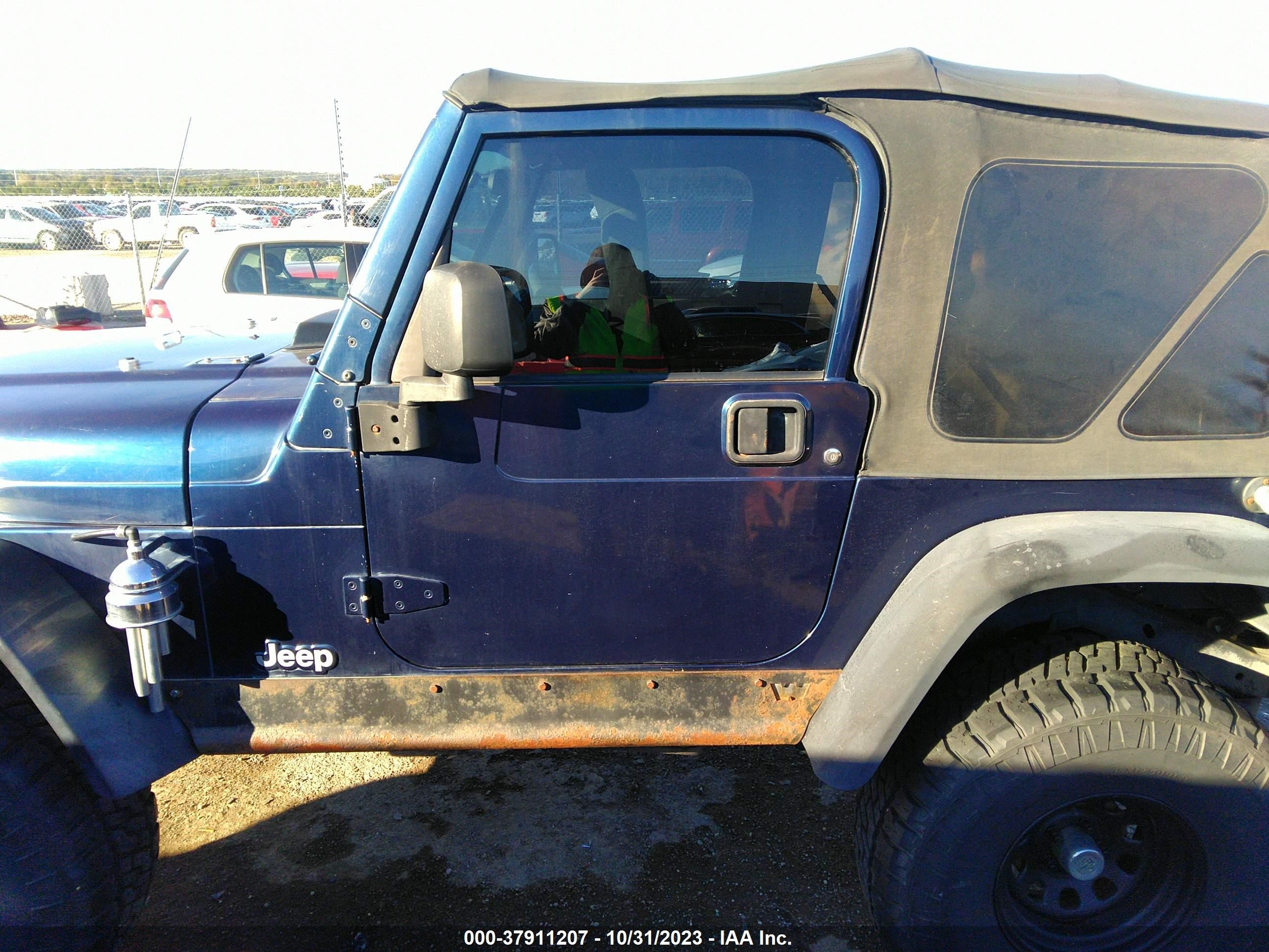 Photo 13 VIN: 1J4FA39S34P714967 - JEEP WRANGLER 