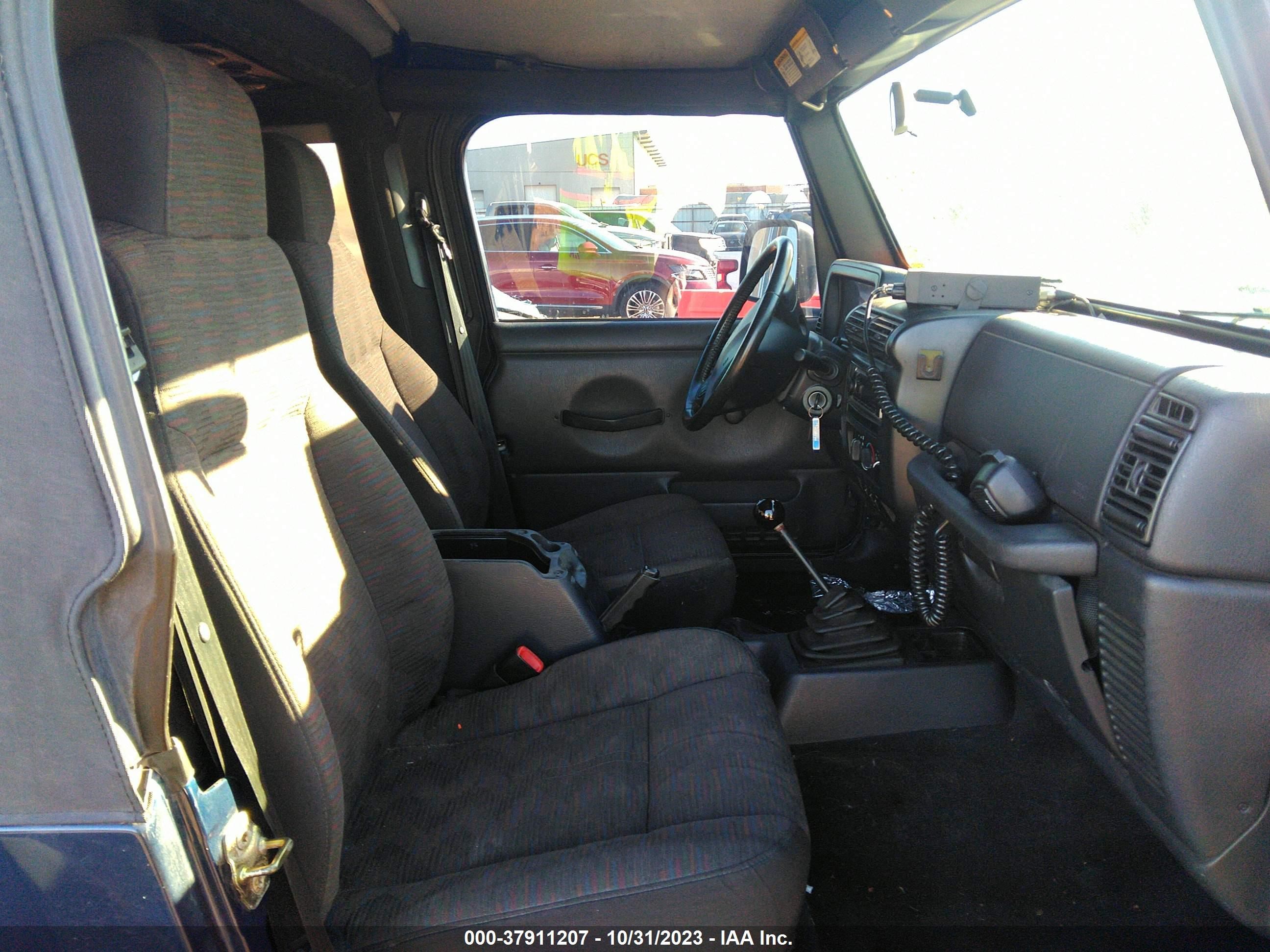 Photo 4 VIN: 1J4FA39S34P714967 - JEEP WRANGLER 