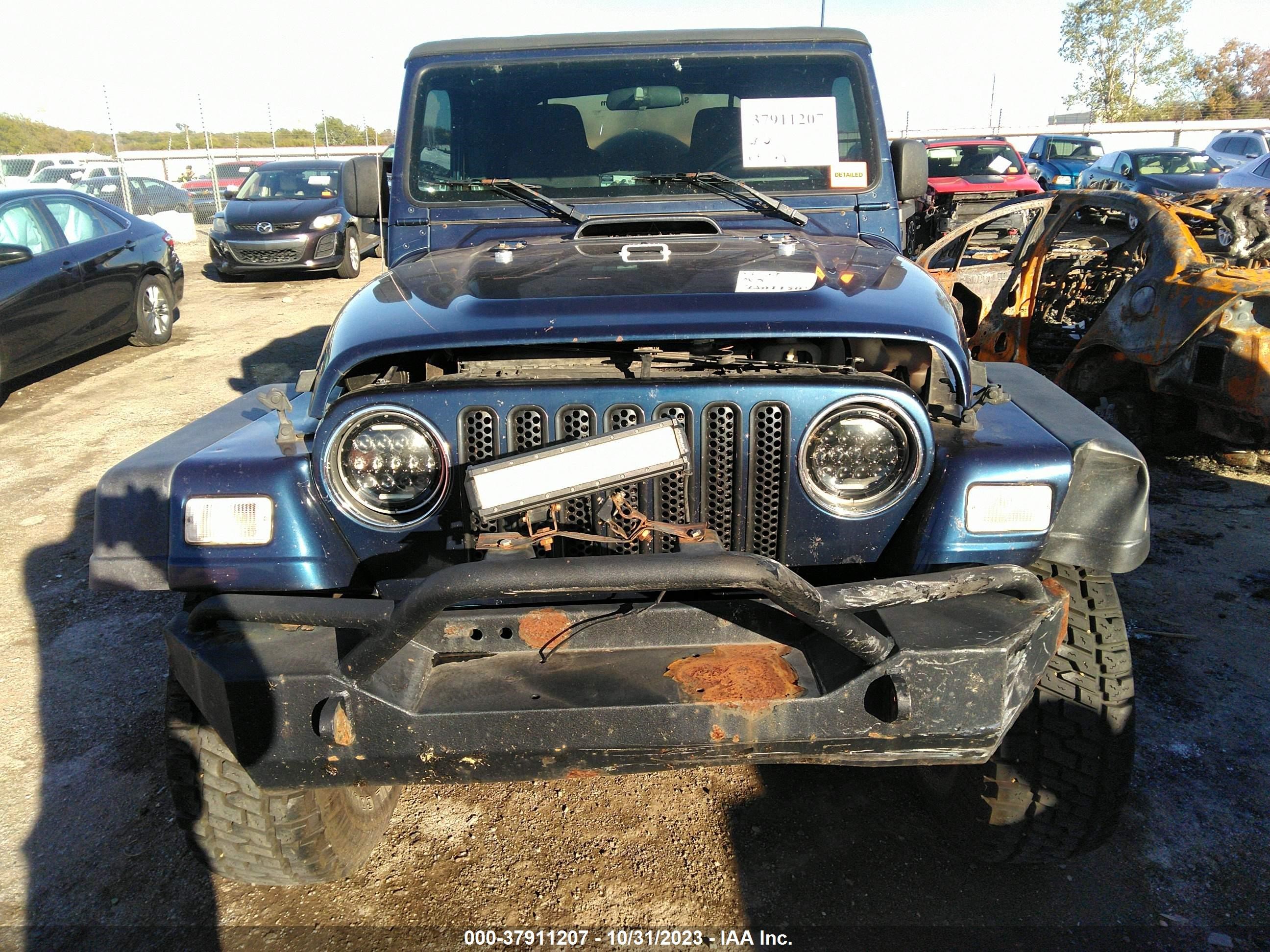 Photo 5 VIN: 1J4FA39S34P714967 - JEEP WRANGLER 