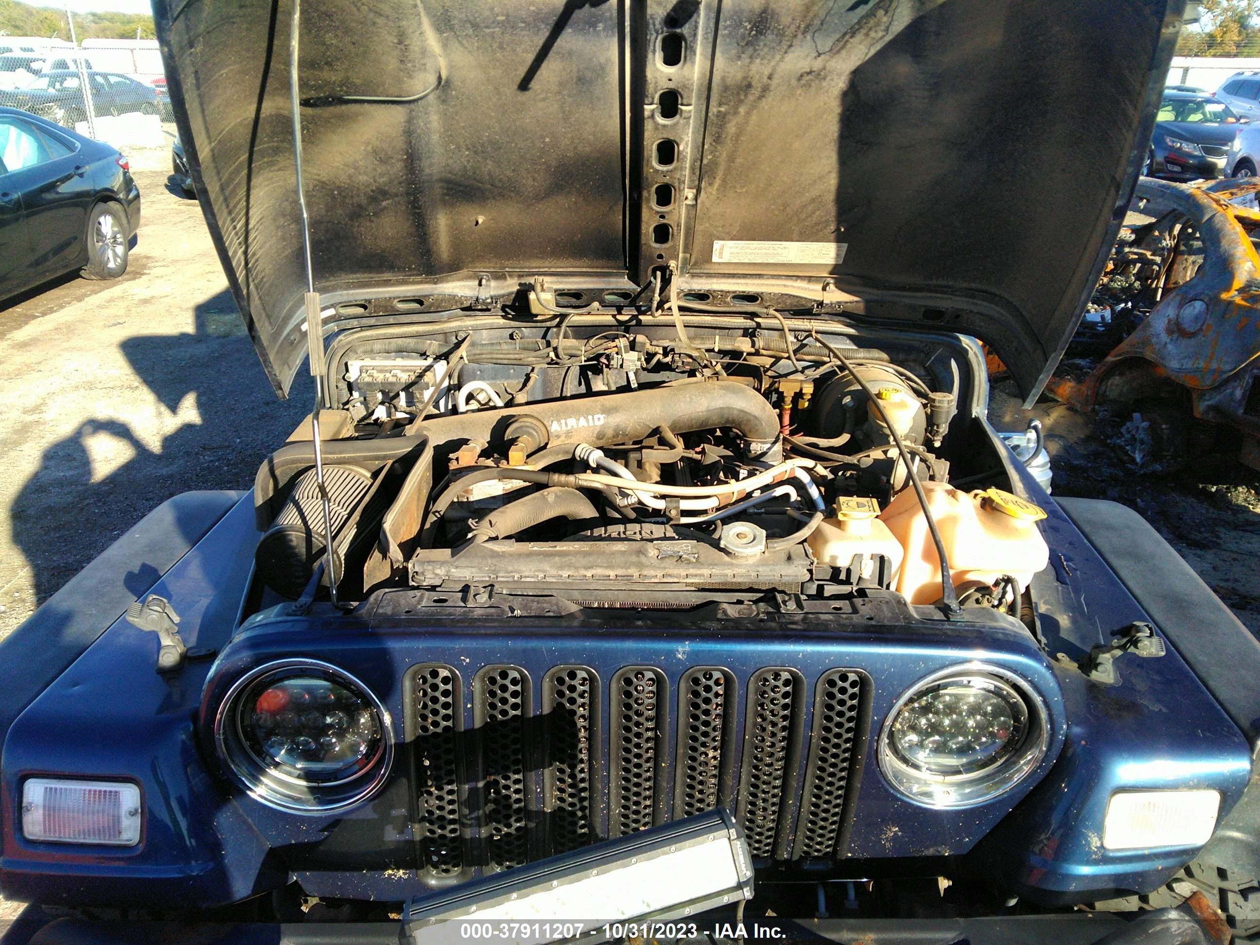 Photo 9 VIN: 1J4FA39S34P714967 - JEEP WRANGLER 