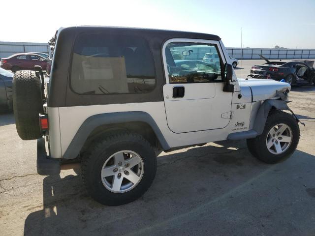 Photo 2 VIN: 1J4FA39S64P717619 - JEEP WRANGLER 