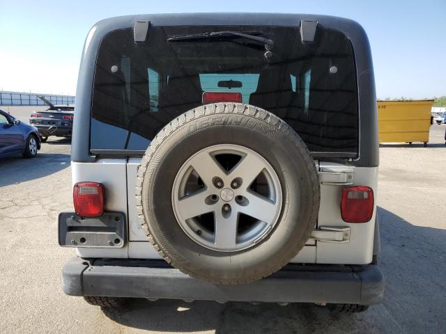 Photo 5 VIN: 1J4FA39S64P717619 - JEEP WRANGLER 