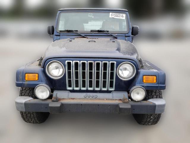 Photo 4 VIN: 1J4FA39S65P370102 - JEEP WRANGLER 