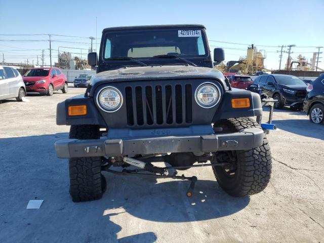 Photo 4 VIN: 1J4FA39S74P717189 - JEEP WRANGLER 