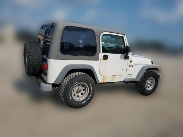 Photo 2 VIN: 1J4FA39SX4P754799 - JEEP WRANGLER 