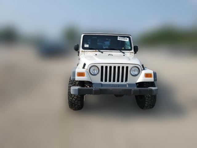 Photo 4 VIN: 1J4FA39SX4P754799 - JEEP WRANGLER 