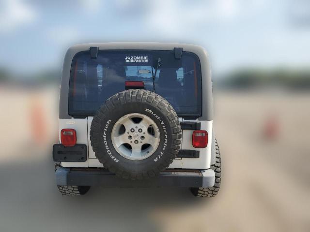 Photo 5 VIN: 1J4FA39SX4P754799 - JEEP WRANGLER 