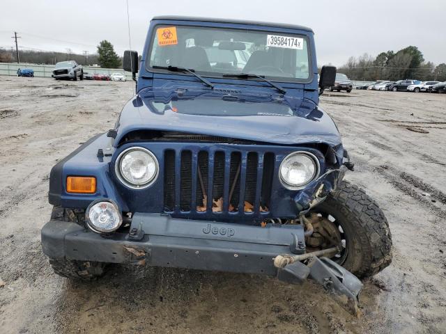 Photo 4 VIN: 1J4FA49S02P761490 - JEEP WRANGLER 