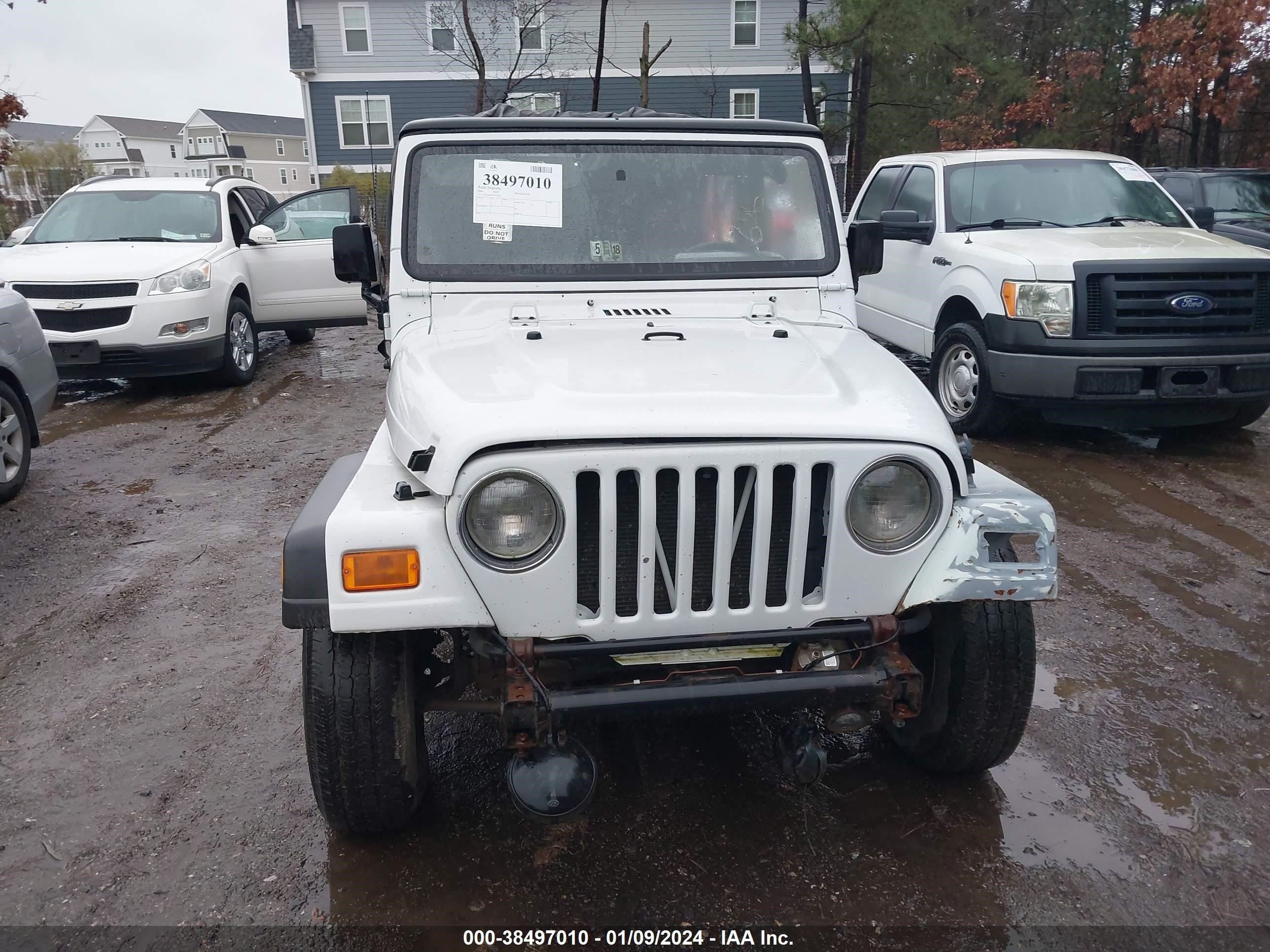 Photo 11 VIN: 1J4FA49S1YP781207 - JEEP WRANGLER 