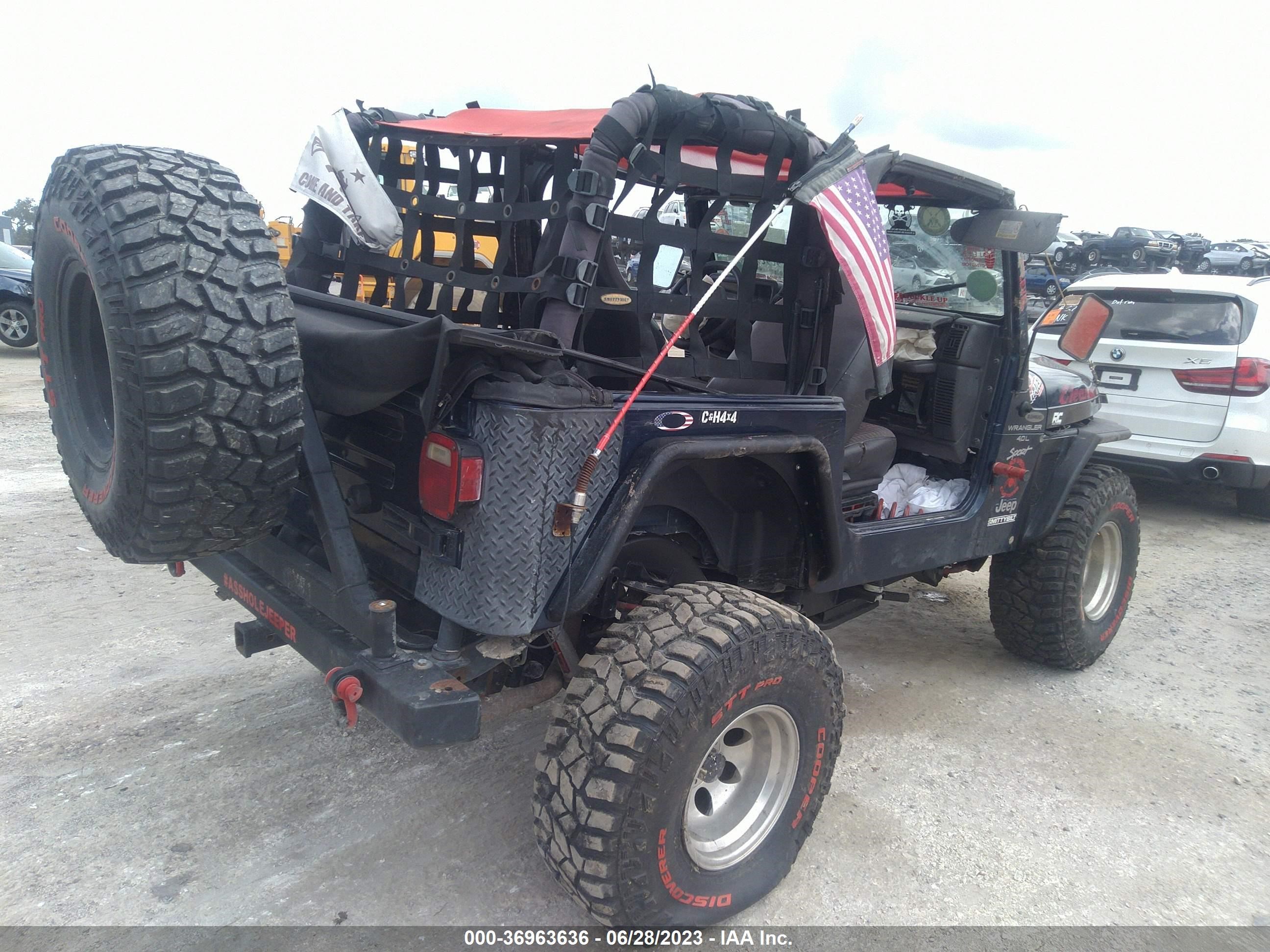 Photo 3 VIN: 1J4FA49S1YP803643 - JEEP WRANGLER 