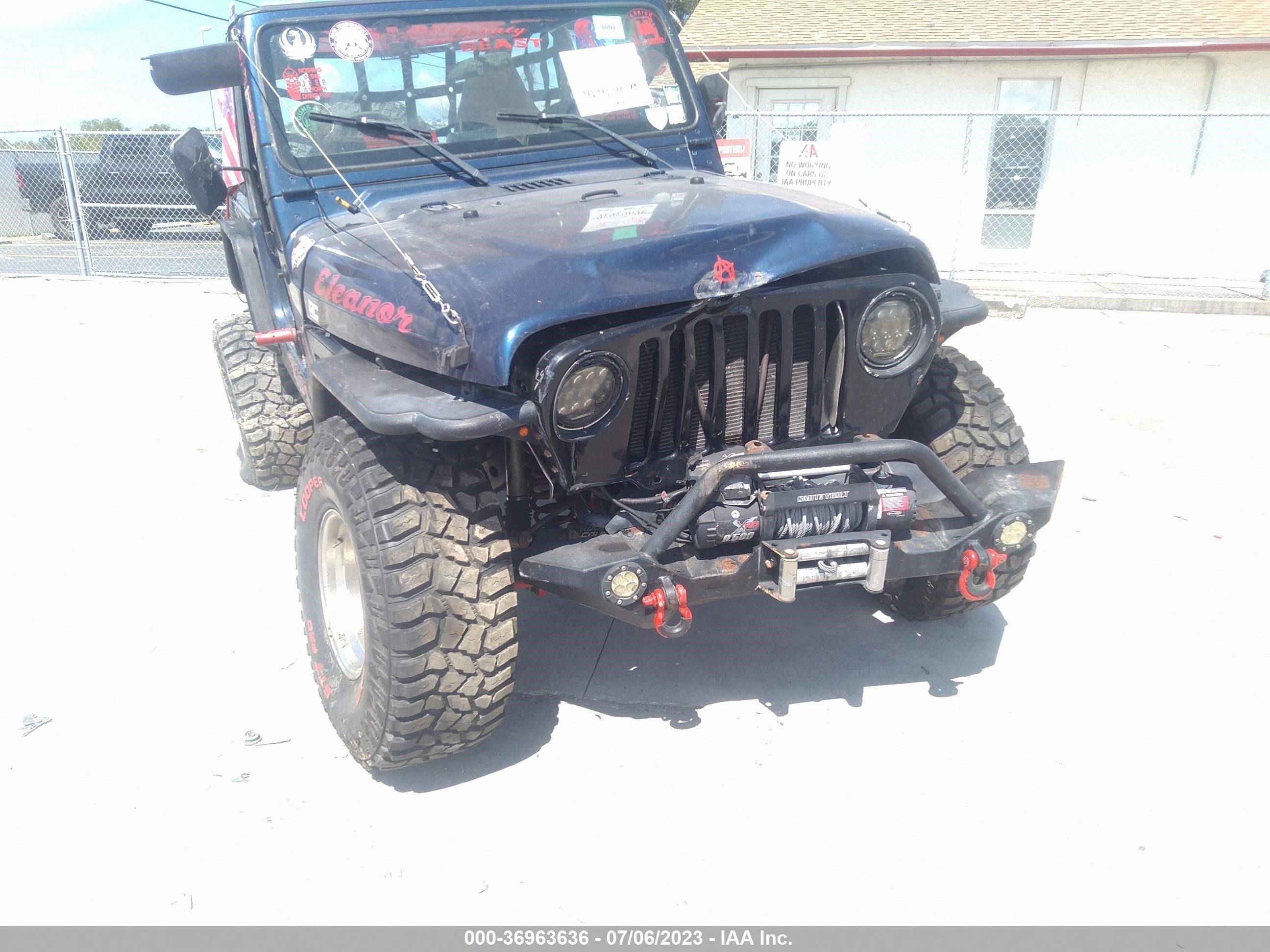 Photo 5 VIN: 1J4FA49S1YP803643 - JEEP WRANGLER 