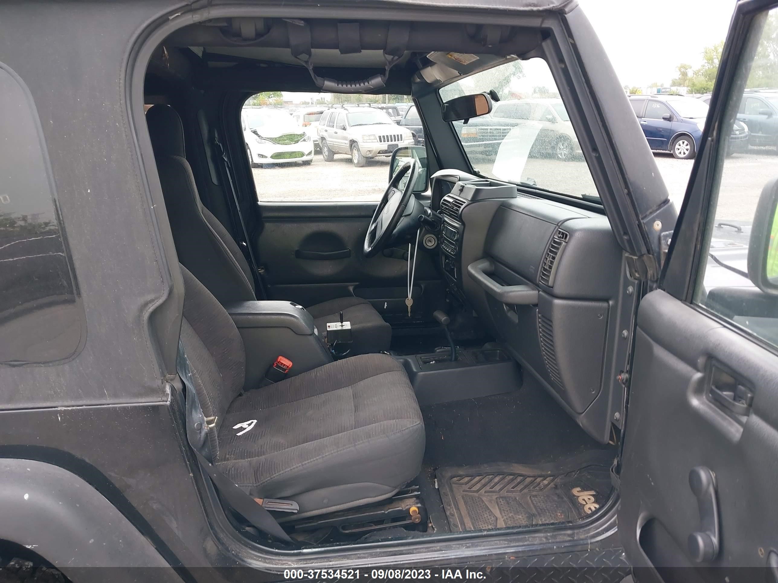 Photo 4 VIN: 1J4FA49S23P302057 - JEEP WRANGLER 