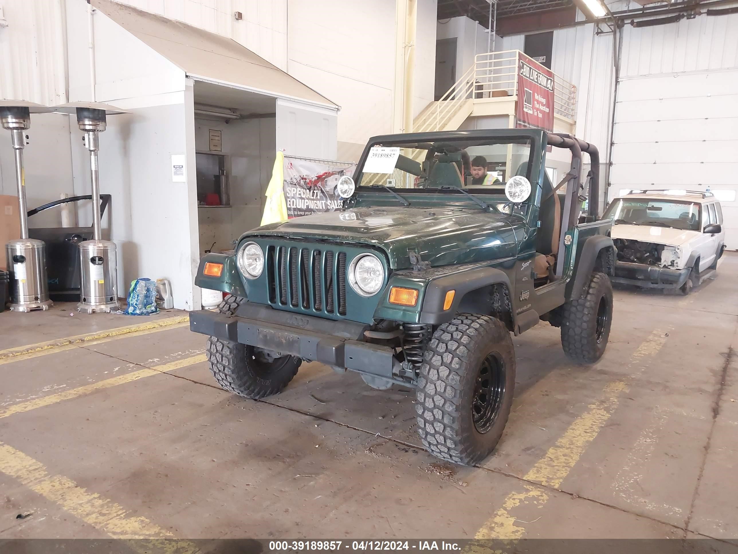 Photo 1 VIN: 1J4FA49S2YP719010 - JEEP WRANGLER 