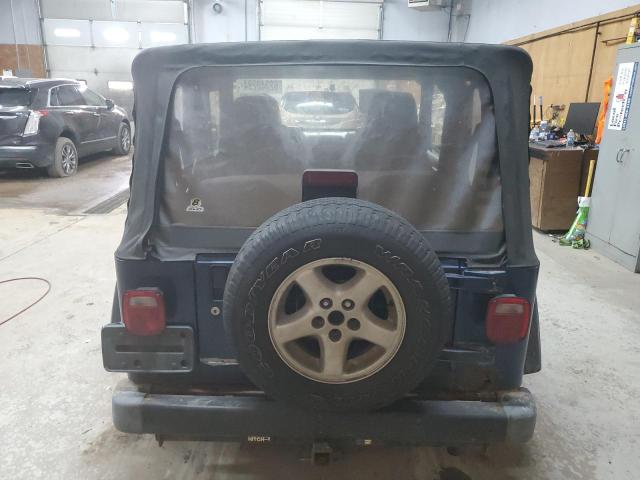 Photo 5 VIN: 1J4FA49S34P724257 - JEEP WRANGLER 