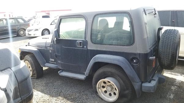 Photo 4 VIN: 1J4FA49S35P306363 - JEEP WRANGLER 