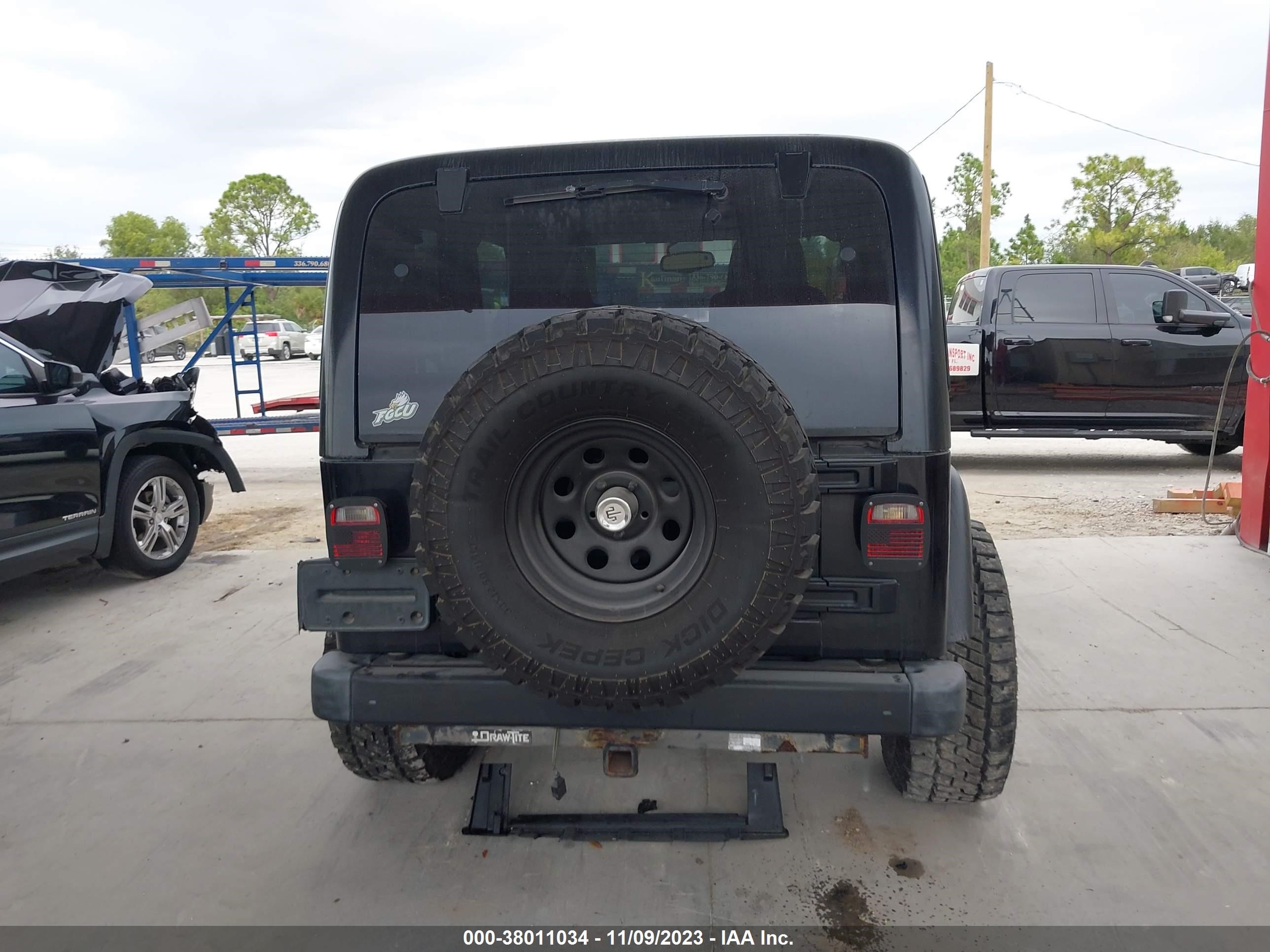 Photo 11 VIN: 1J4FA49S35P381273 - JEEP WRANGLER 