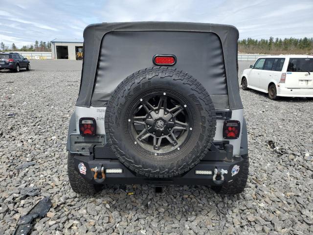 Photo 5 VIN: 1J4FA49S44P798061 - JEEP WRANGLER 