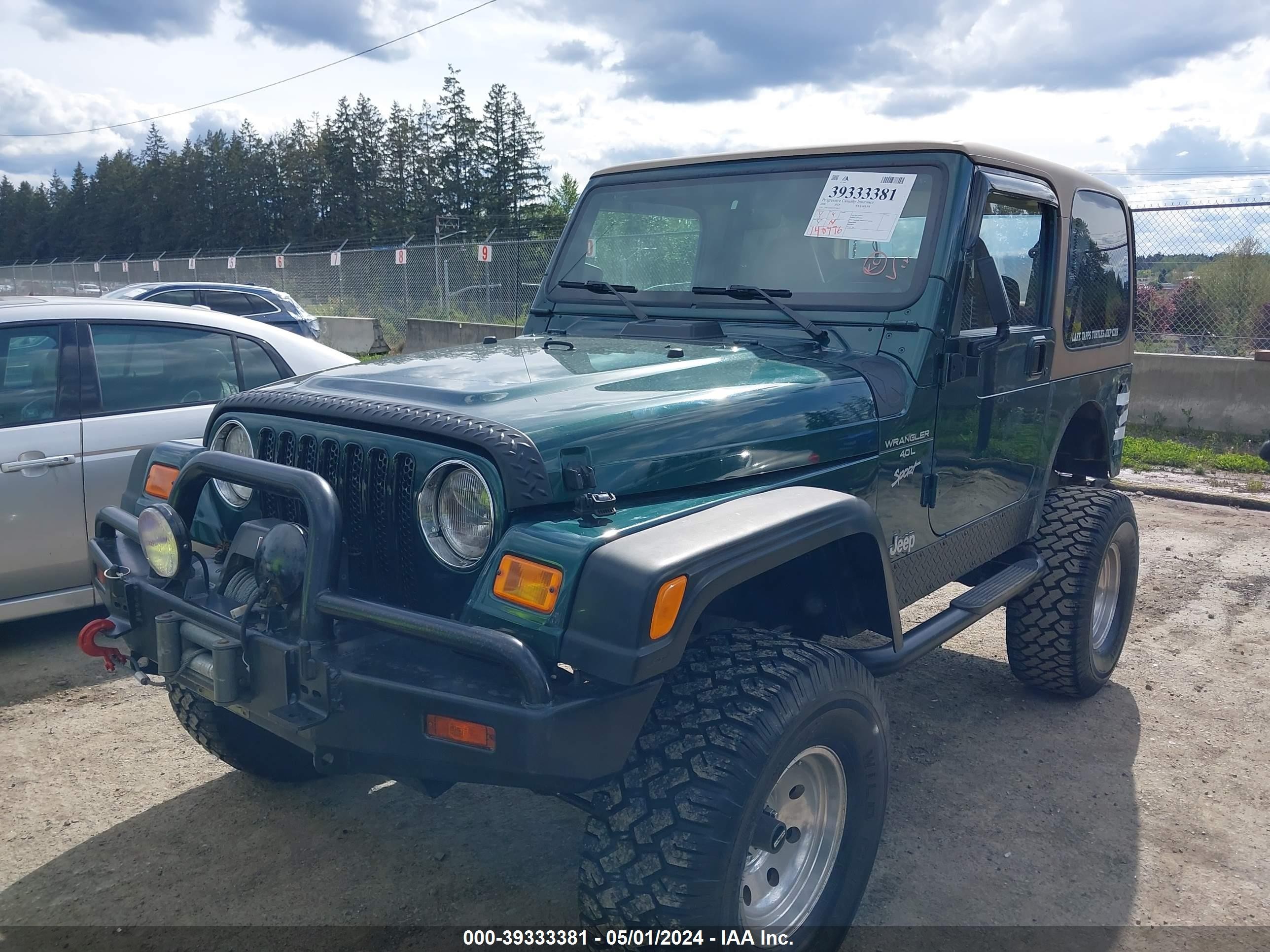 Photo 1 VIN: 1J4FA49S4YP759637 - JEEP WRANGLER 