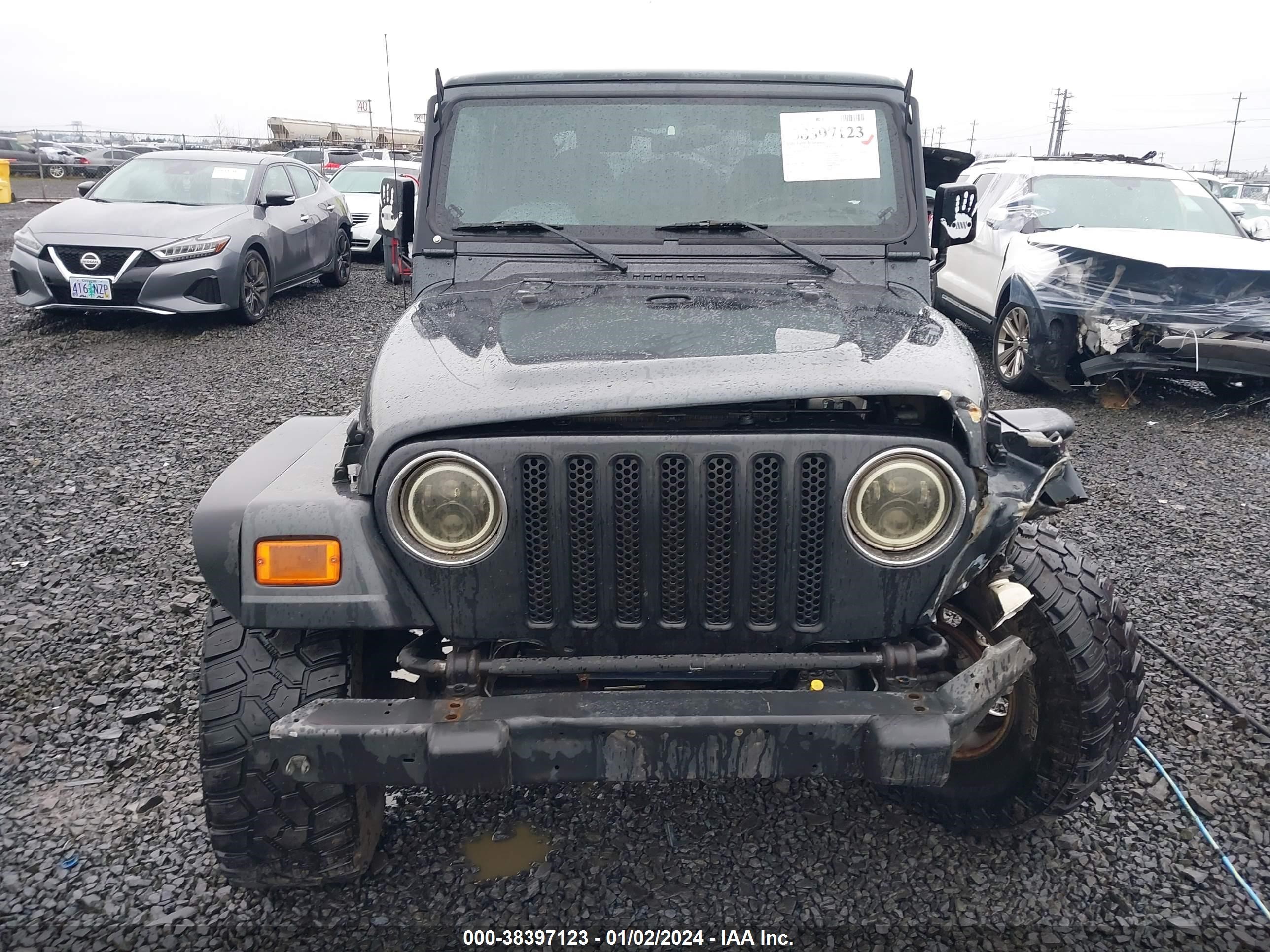 Photo 12 VIN: 1J4FA49S51P371581 - JEEP WRANGLER 